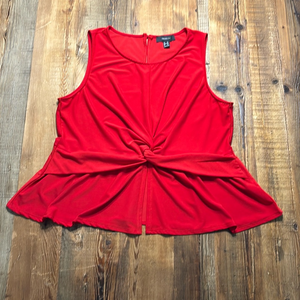 Red sleeveless top